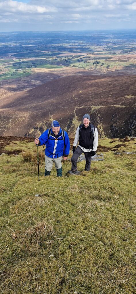 May be an image of 2 people, mountain and Arthur's Seat