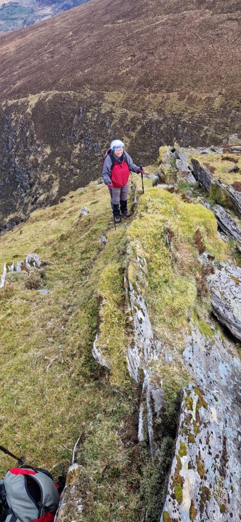May be an image of 1 person, climbing and mountain