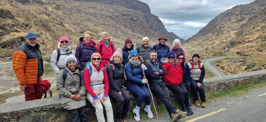 May be an image of 13 people, Saqsaywaman, road and mountain