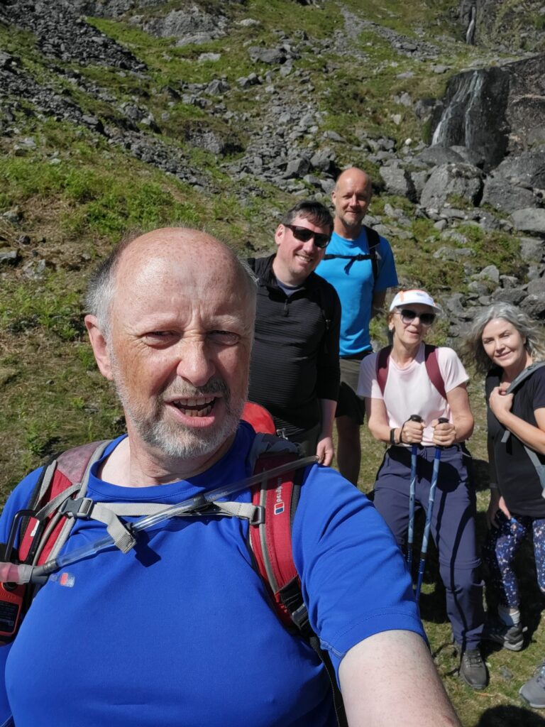 May be an image of 2 people and people climbing