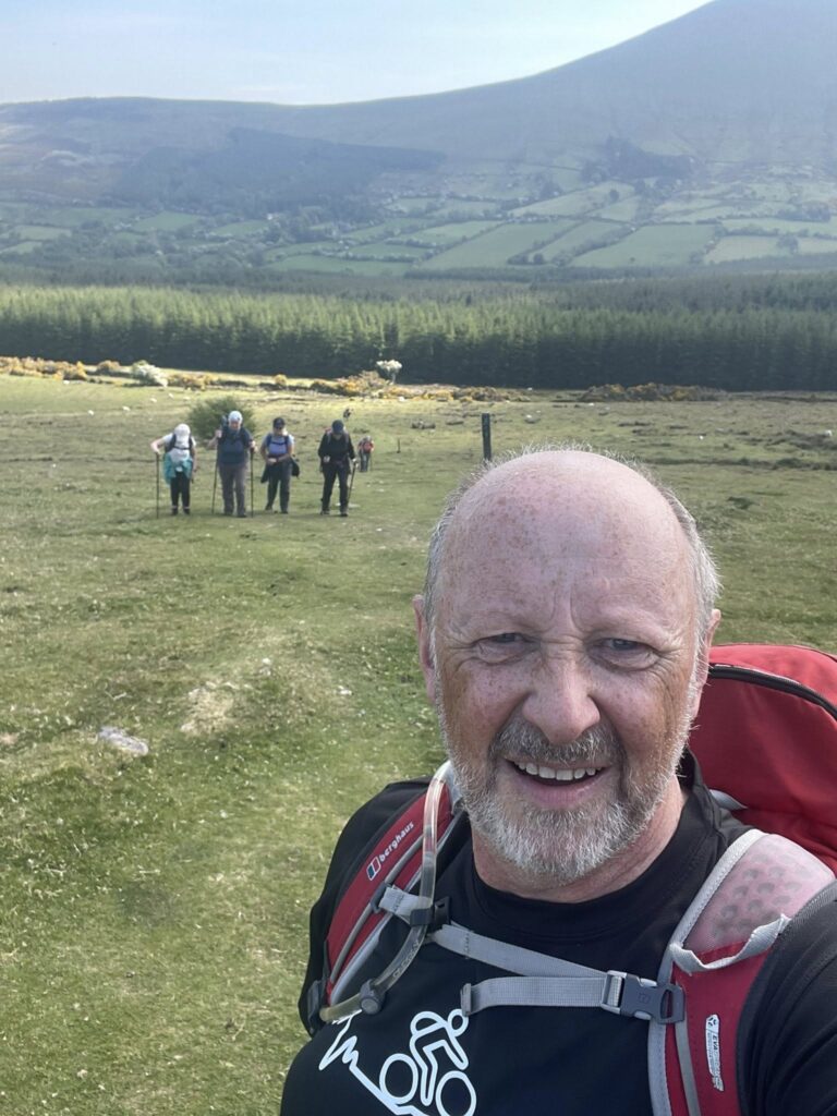 May be an image of 4 people and mountain